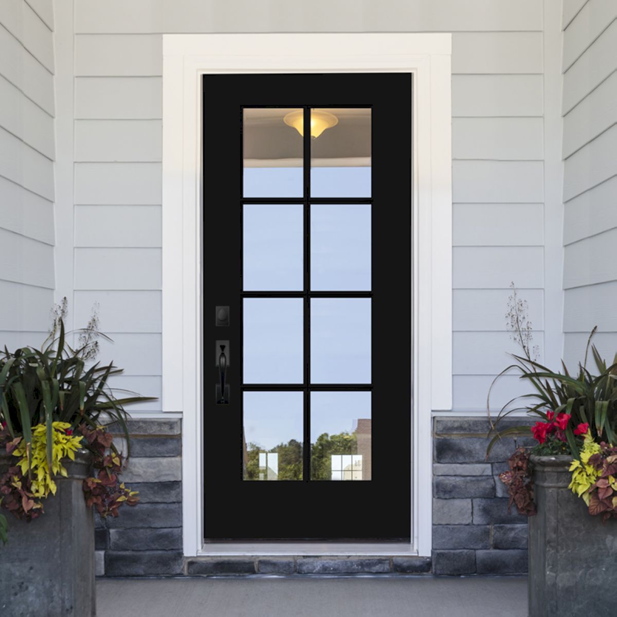 Cửa chính 1 cánh nhôm kính màu đen chia ô mở quay