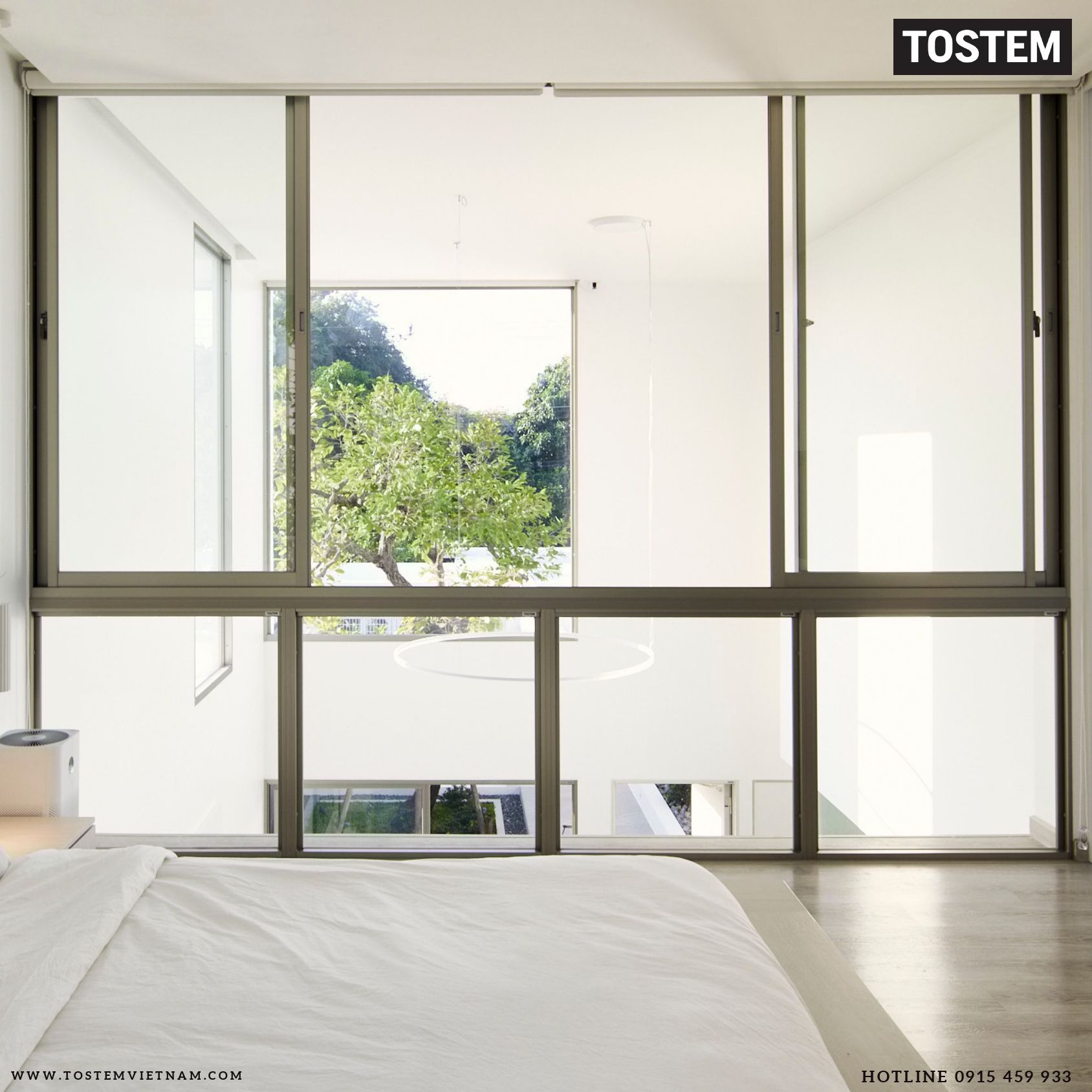 Cửa nhôm lùa 4 cánh kết hợp vách cố định của TOSTEM cho phòng ngủ