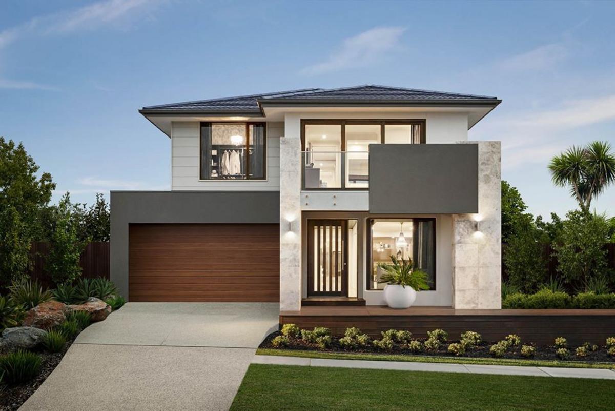 Nhà 2 tầng nông thôn thu hút thị giác với mảng tường ốp đá tự nhiên màu be