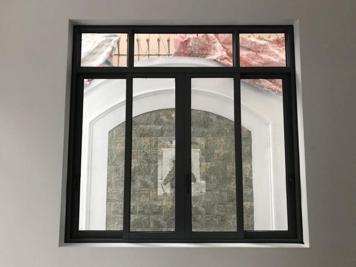 A 4-panel aluminium sliding window adds beauty to modern interiors.
