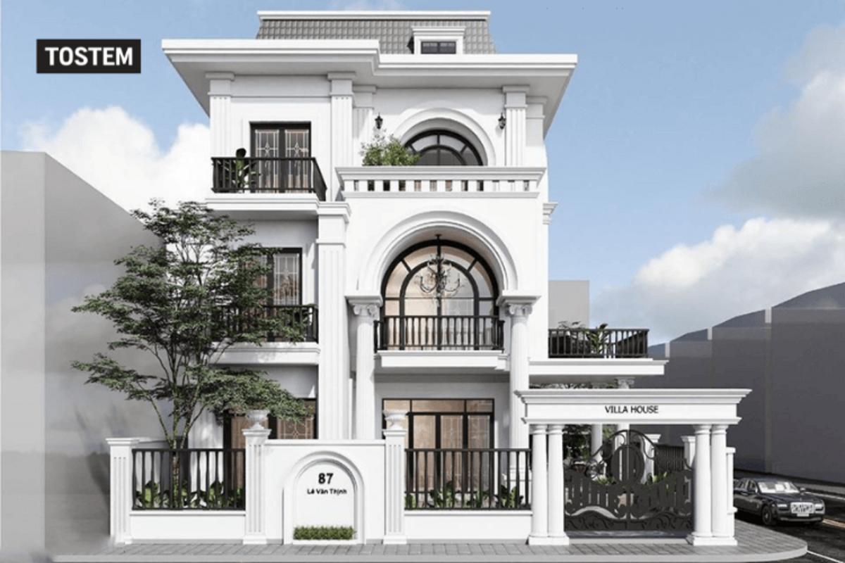 Arch window design in India enhances villa luxury and sophistication.