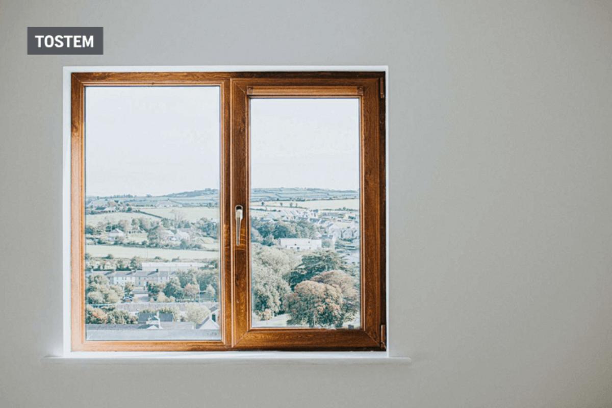 Beautiful 2-panel casement glass windows with wooden frames from window material types