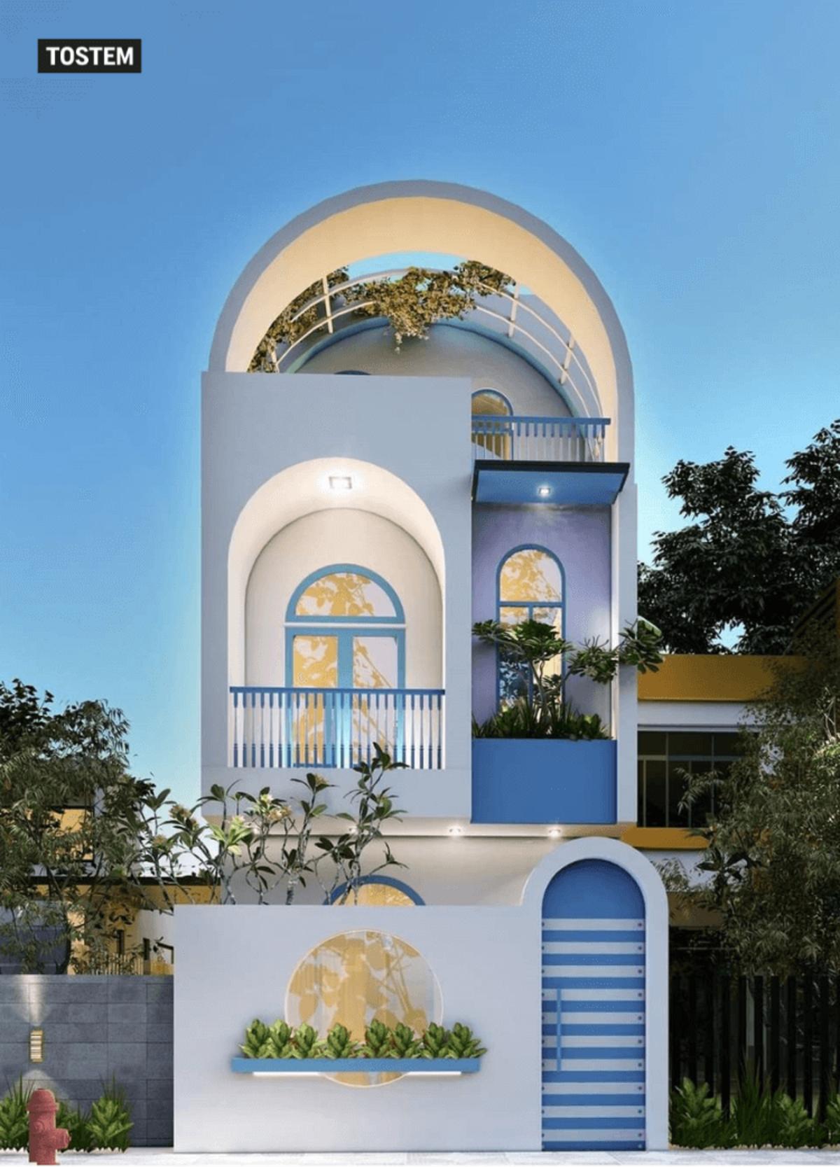 Fresh blue painted arch window design in India adds a modern touch.