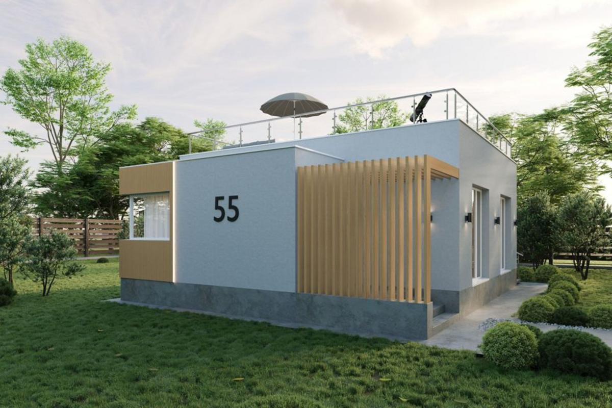 mẫu nhà cấp 4 mái bằng nông thôn có sân thượng với ban công kính trong suốt