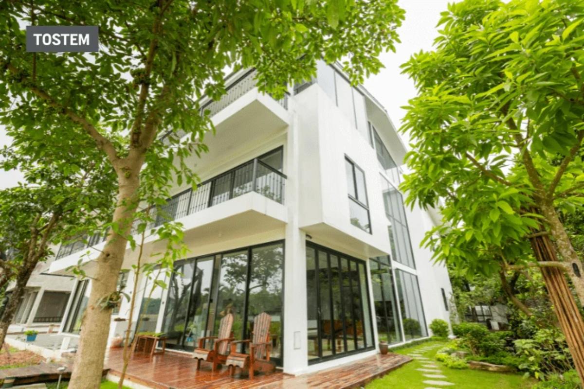 Modern aluminum glass door design with window for residences.