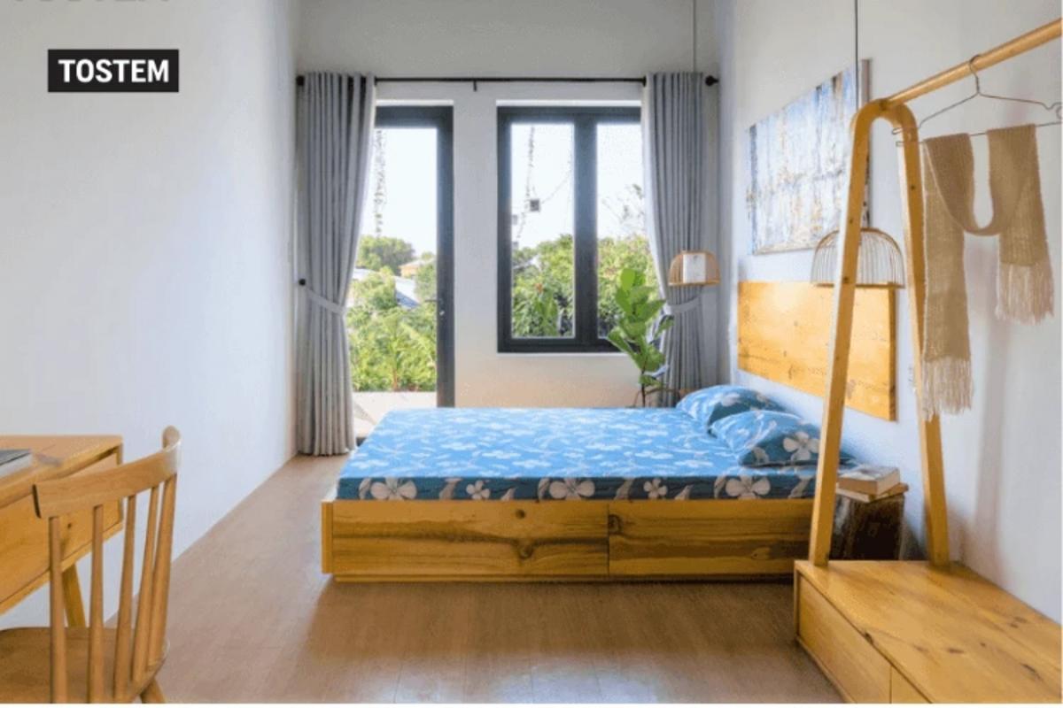 Modern bedroom with aluminum and glass double casement window