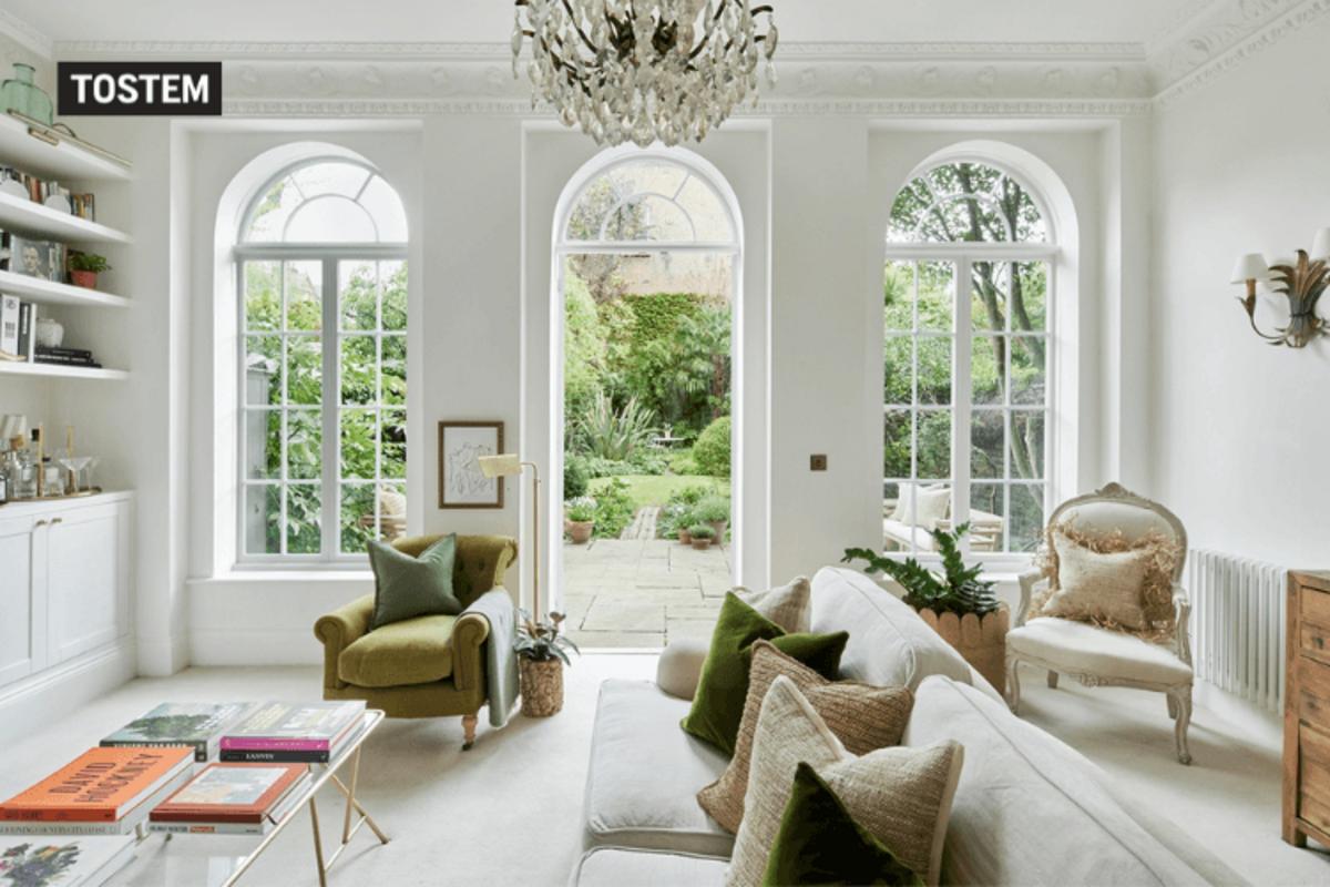 Neoclassical aluminium arch window design in India adds elegance.