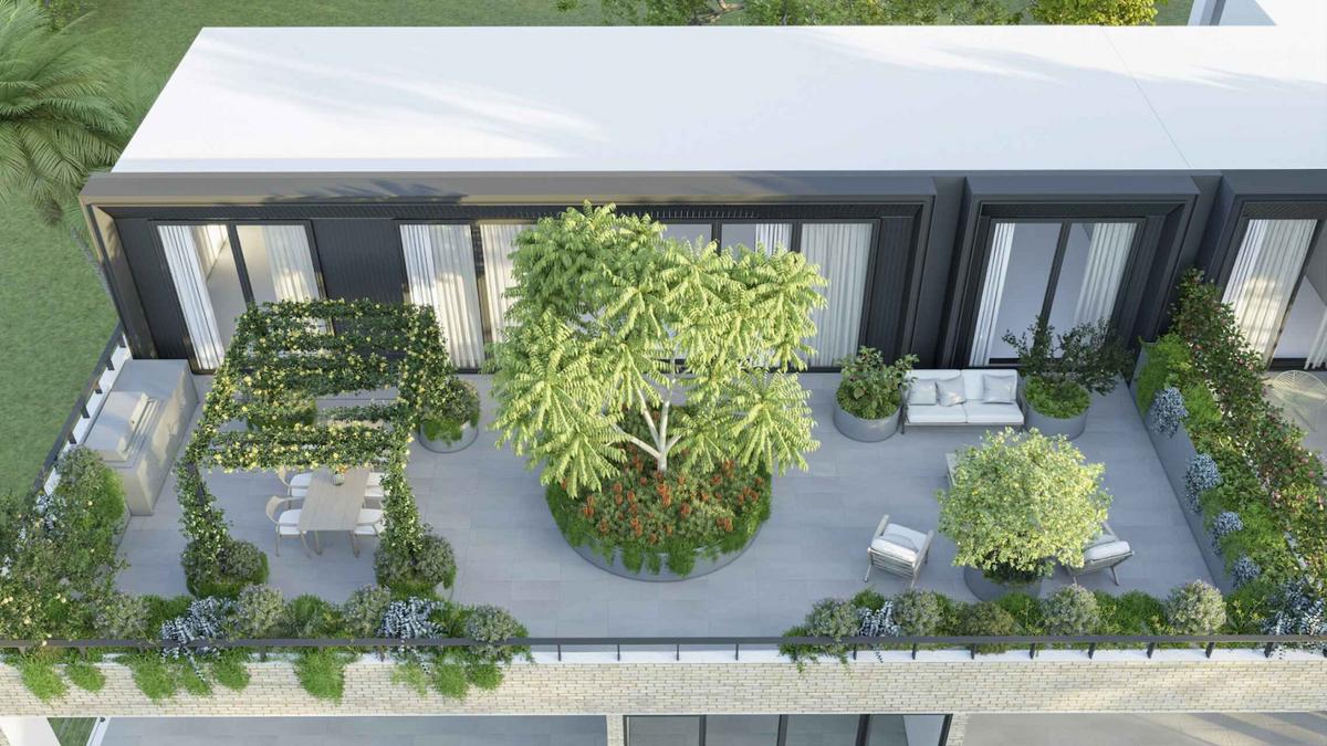 Sân thượng được phủ xanh tạo cảm giác gần gũi và trong lành.