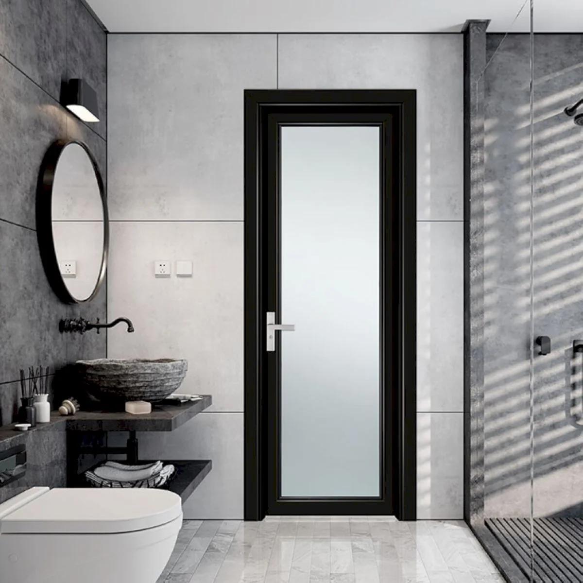 Single-leaf aluminium swing door with matte frame, frosted glass at modern ceramics vile parle