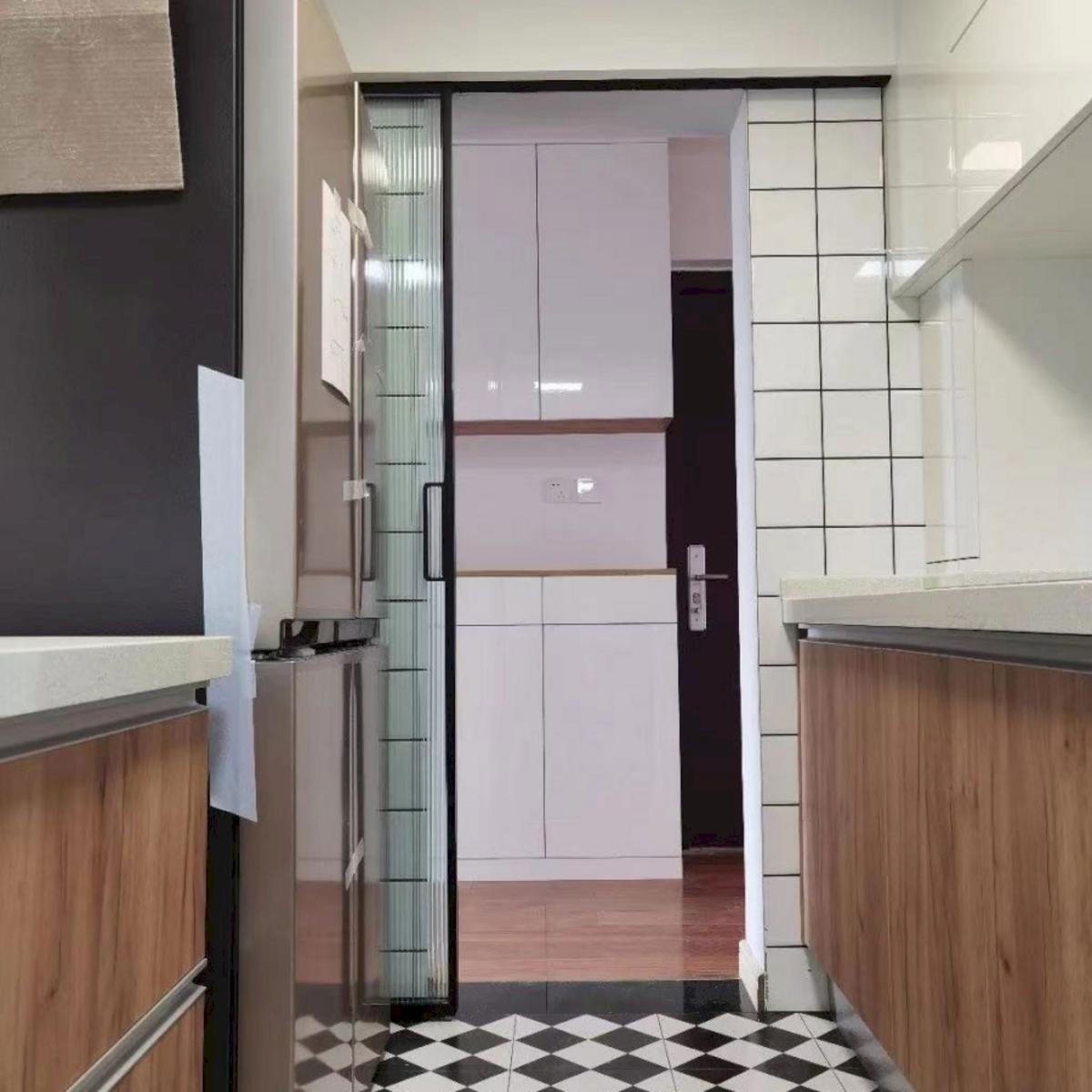 Single panel aluminum slide door design fits compact kitchen spaces.