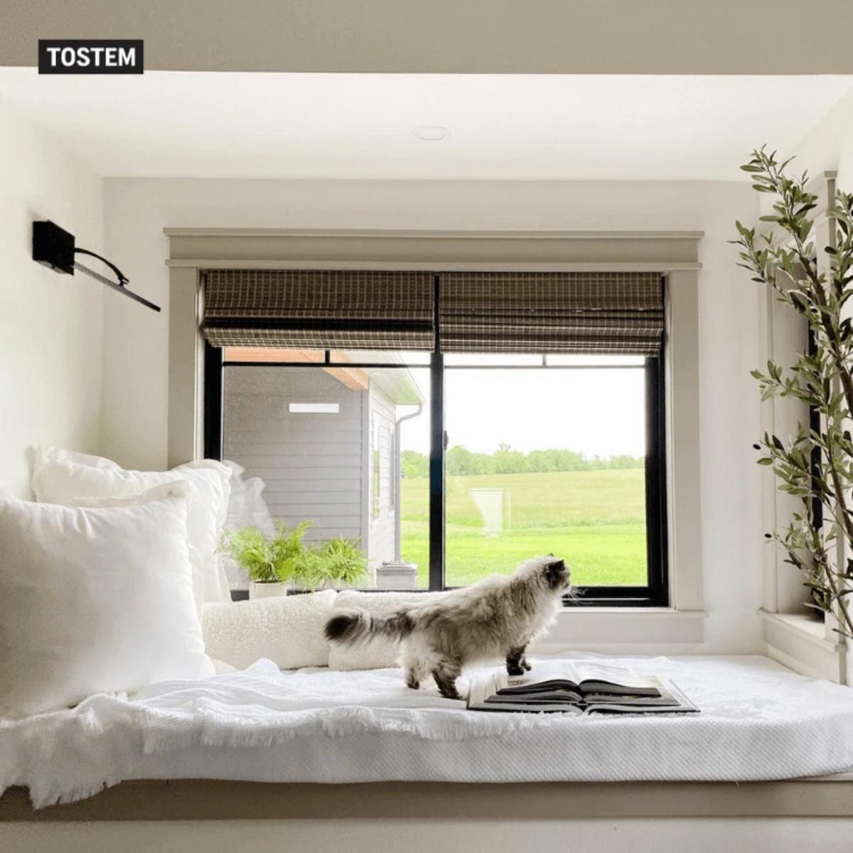Sliding bedroom door with window design enhances airflow.