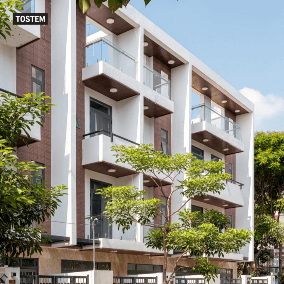 TOSTEM aluminum and glass double casement windows for residences