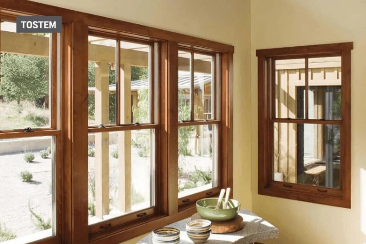 Wood-framed glass ಕಿಟಕಿ ಡಿಸೈನ್ in dark brown tone.