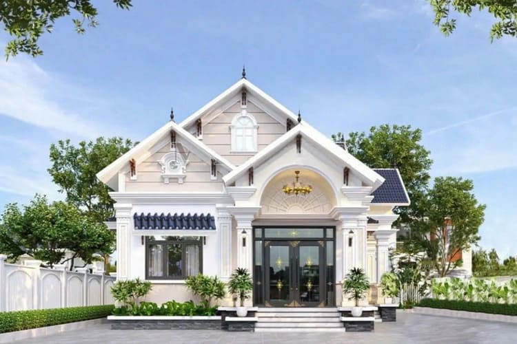 Nhà cấp 4 mái Thái chữ L tân cổ điển đặc trưng bởi chi tiết tinh xảo ở cột, tường hoặc mái
