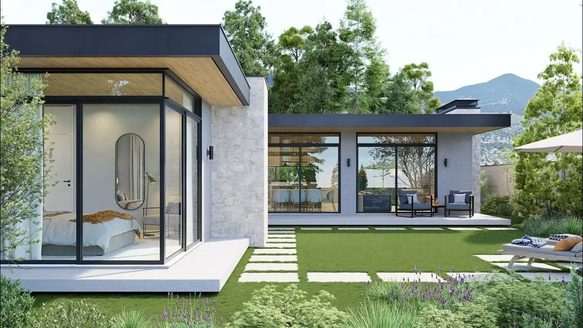 Nhà cấp 4 chữ L với cửa kính kịch trần và sân vườn nhỏ