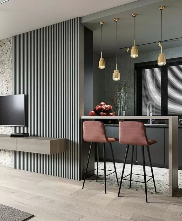 Vách ngăn phòng khách và bếp là điểm nhấn ấn tượng, thể hiện đẳng cấp gia chủ