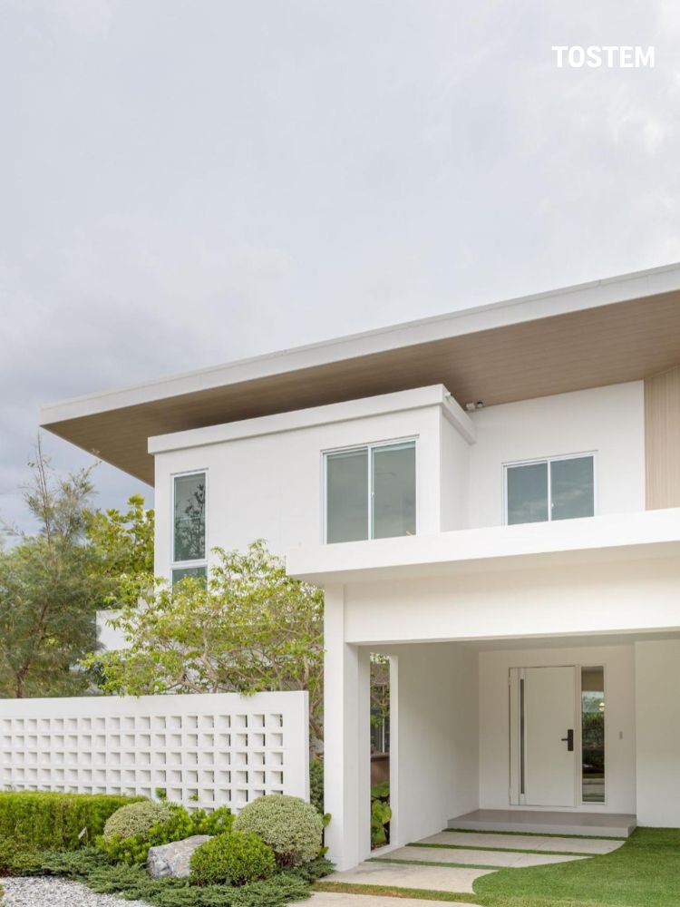 Mẫu nhà 2 tầng phong cách tối giản, tạo điểm nhấn tinh tế với cửa nhôm đẹp